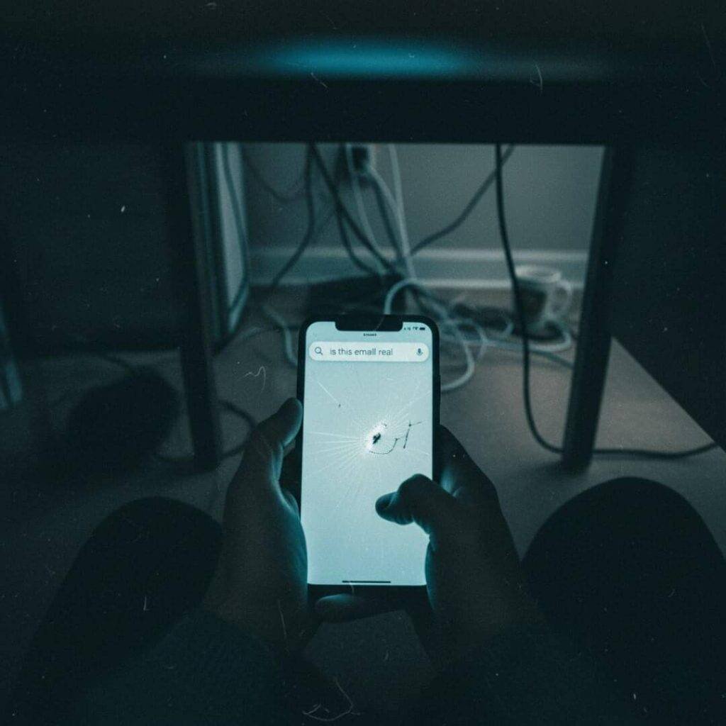 Cracked phone dropped during panicky Google search.